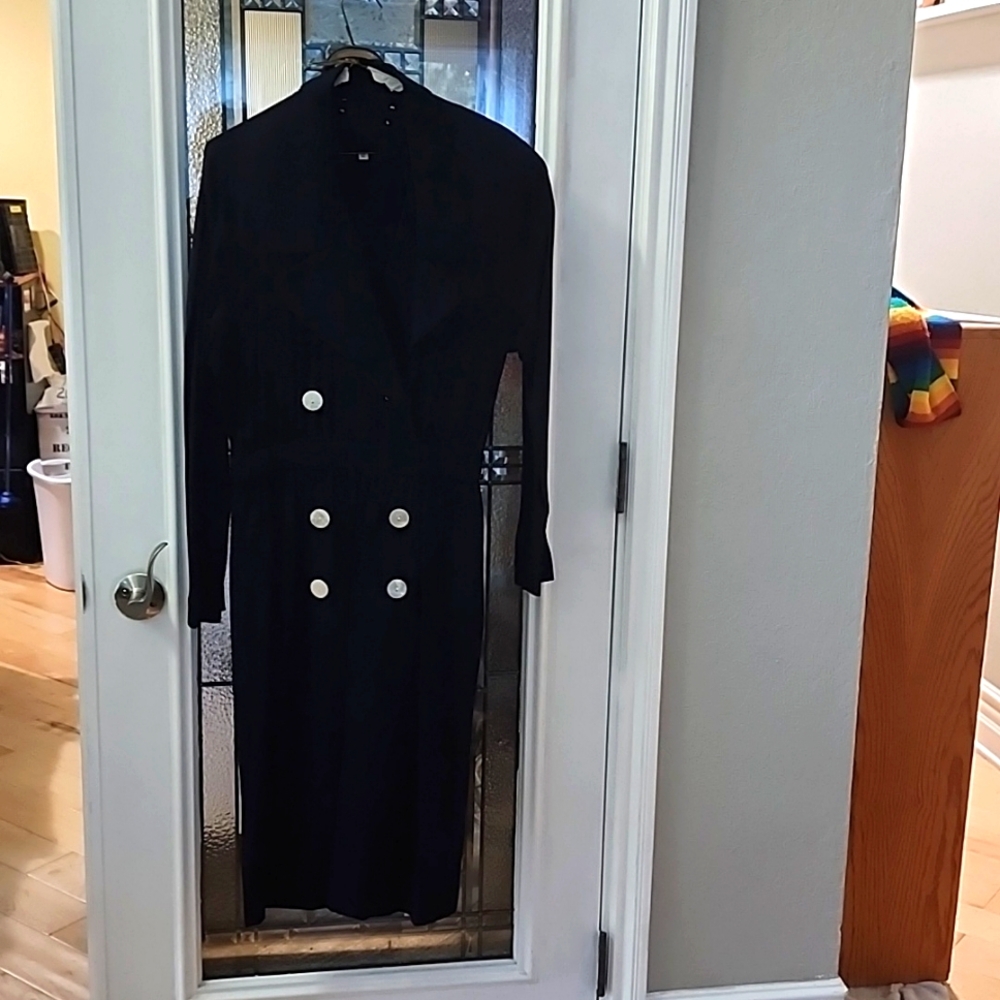 Navy lined crepe dress with crossed bodice and big button closure. Banded waist